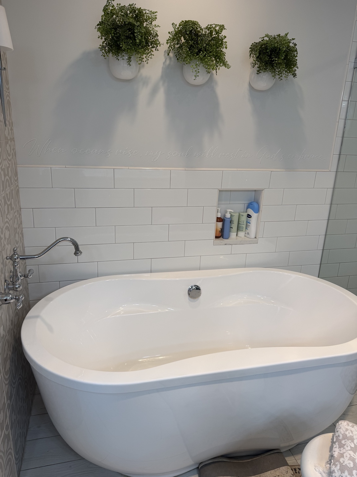 Clean bathroom with white bathtub