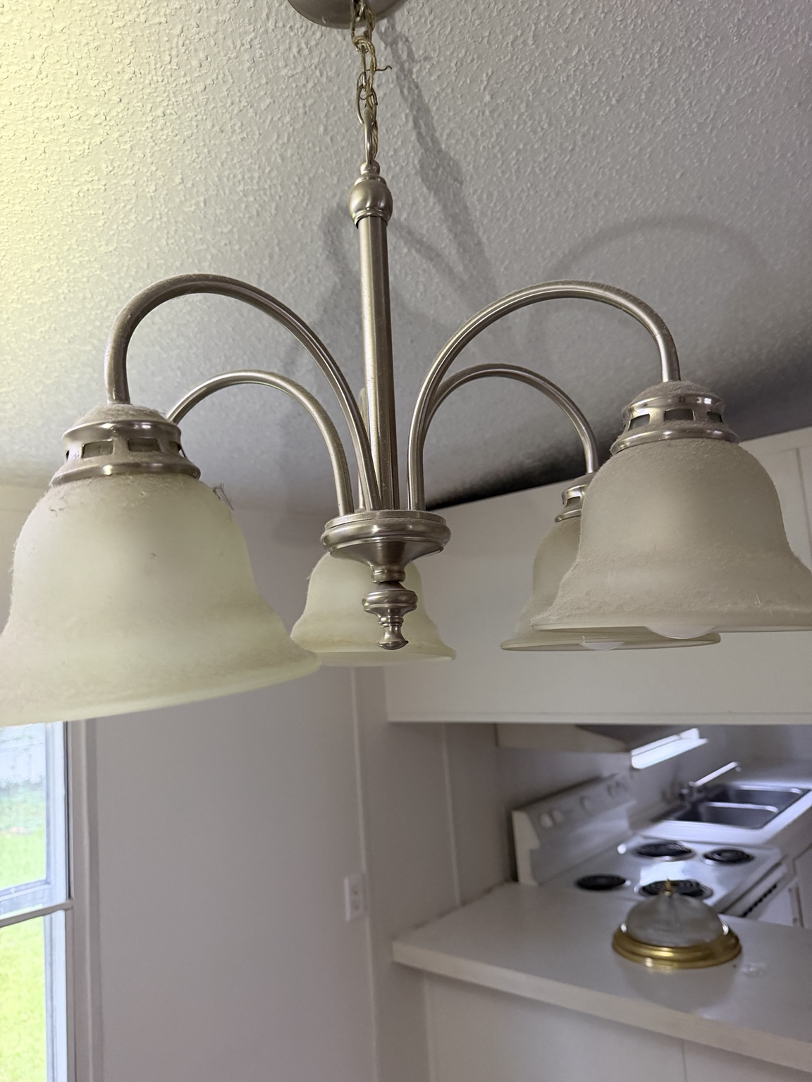 Dirty light fixture before cleaning