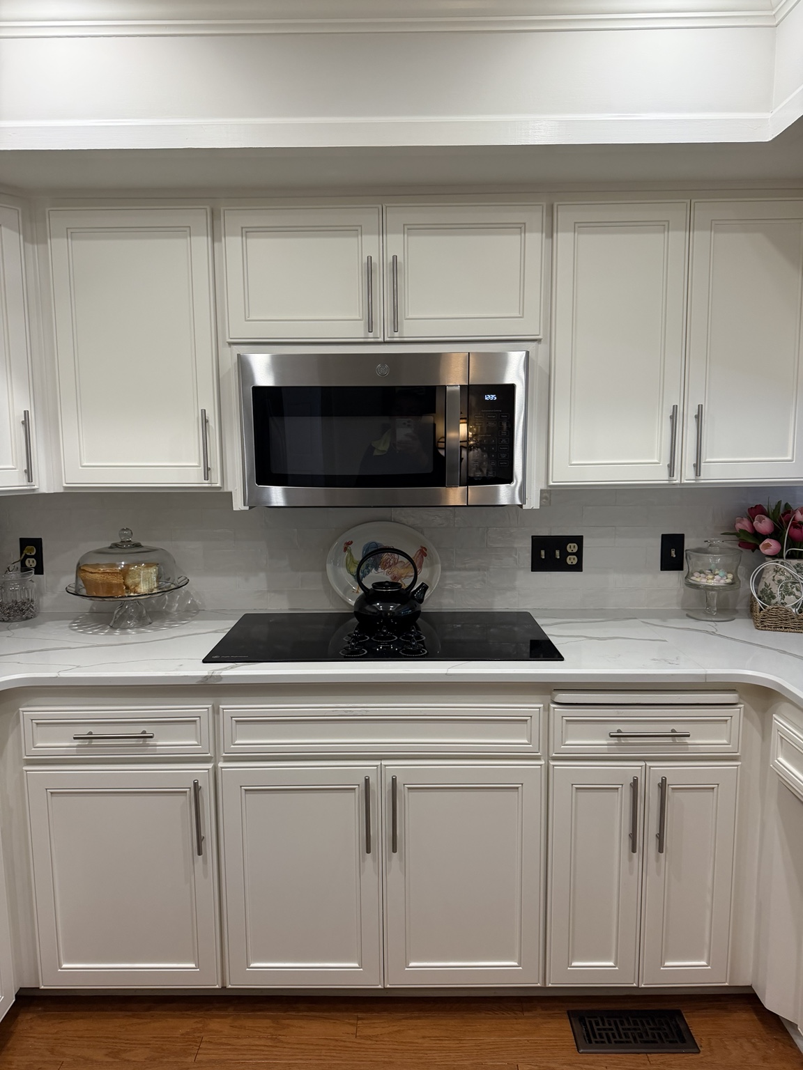 Clean white kitchen cabinetry